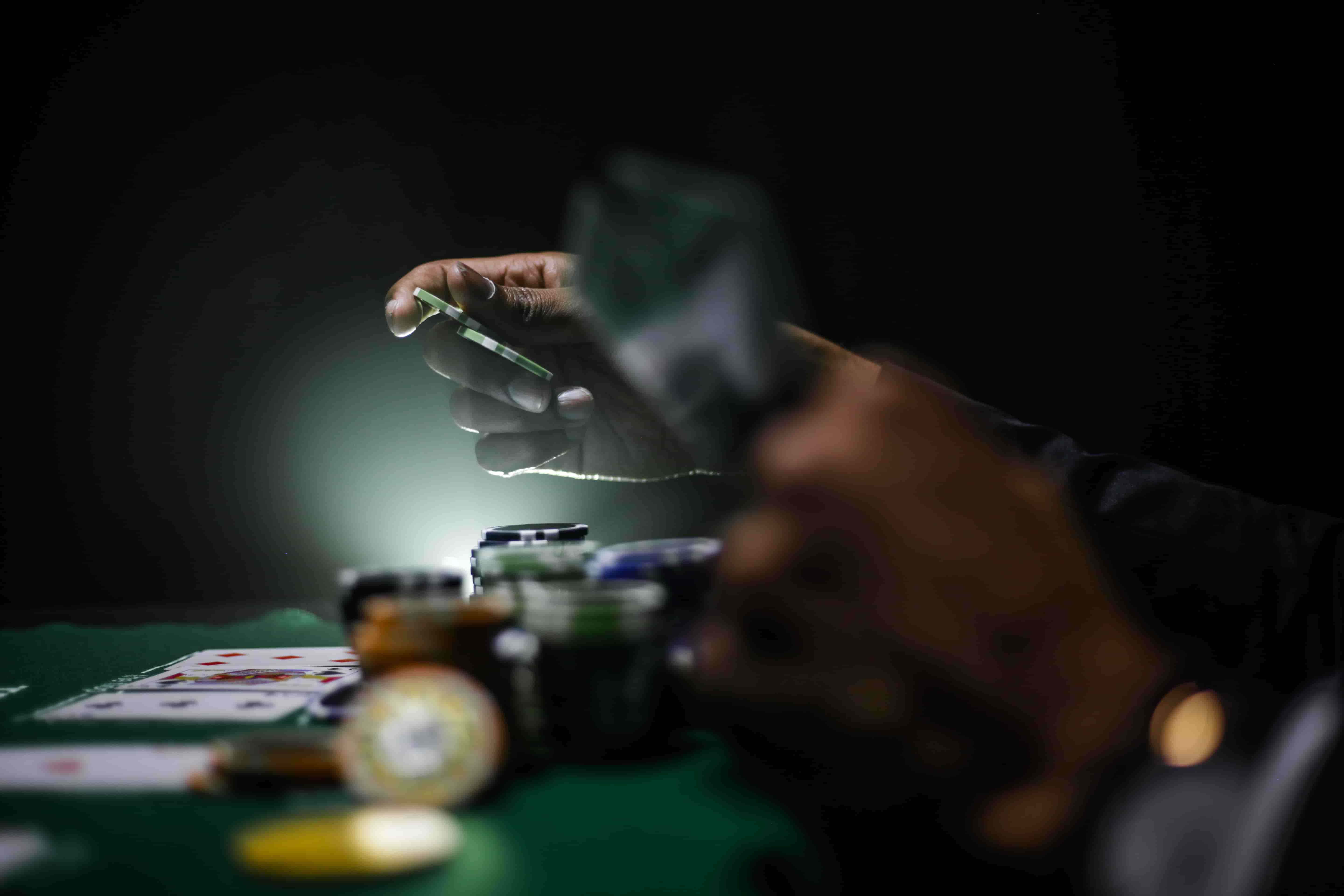 person betting on poker